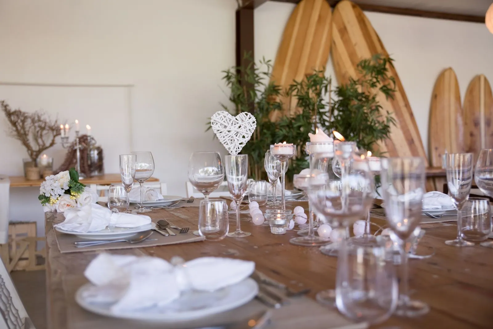 Beautifully arranged table setting with rustic decor, perfect for weddings or elegant events in Portugal.